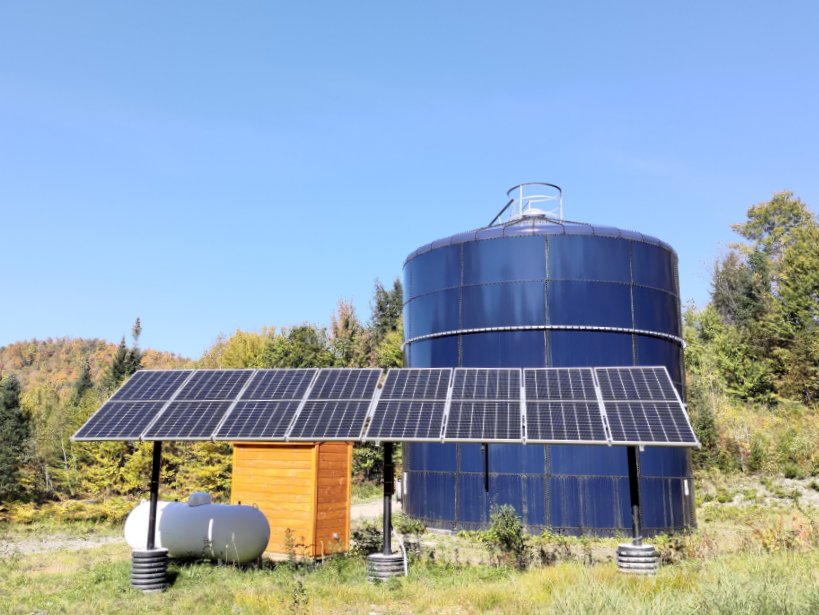 water tower with solar panels